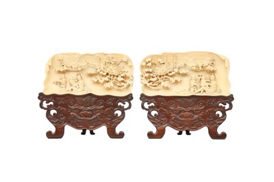 Lot 457 - λ A PAIR OF CHINESE CARVED IVORY WRIST RESTS.