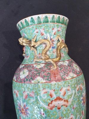Lot 112 - A PAIR OF CHINESE FAMILLE ROSE VASES.