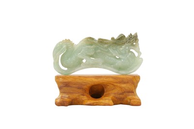Lot 187 - A CHINESE JADEITE CARVING OF A DRAGON.