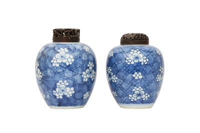 Lot 279 - A NEAR-PAIR OF CHINESE BLUE AND WHITE PRUNUS JARS.