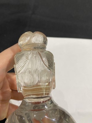 Lot 257 - A CHINESE ROCK CRYSTAL FIGURE OF GUANYIN.
