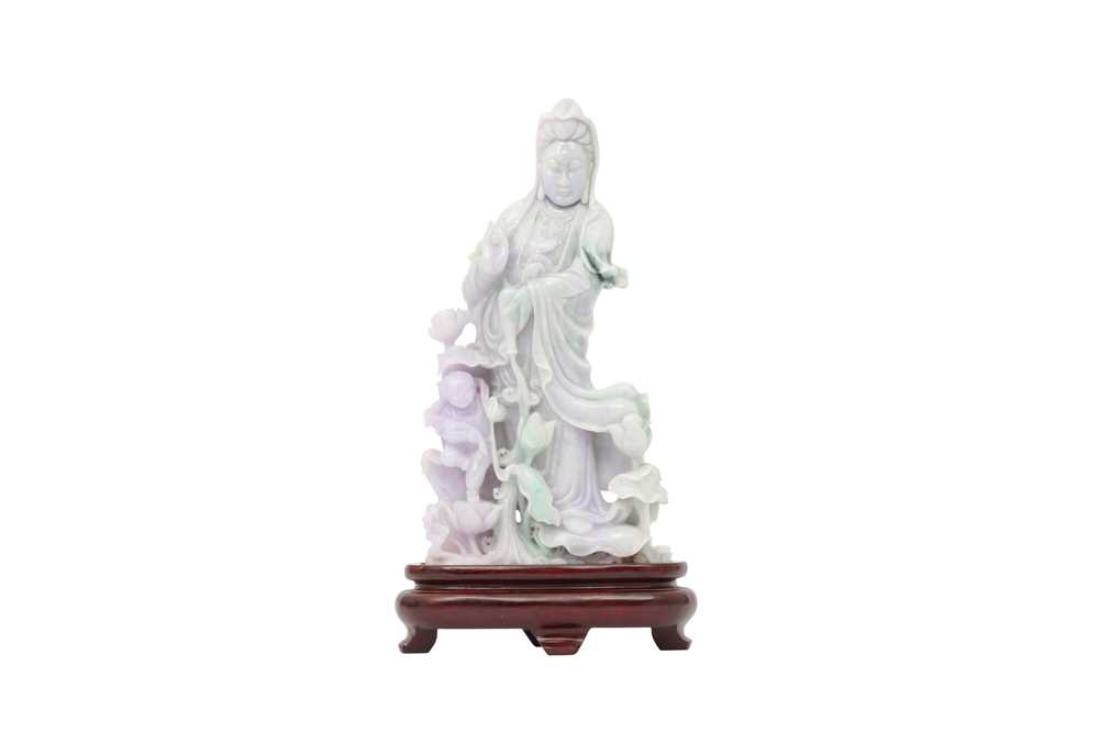 Lot 260 - A CHINESE LAVENDER JADEITE FIGURE OF GUANYIN AND CHILD.