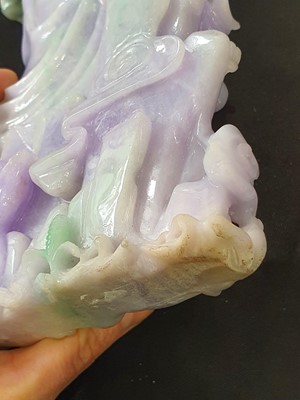 Lot 260 - A CHINESE LAVENDER JADEITE FIGURE OF GUANYIN AND CHILD.