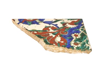 Lot 340 - A FRAGMENTED POTTERY TILE WITH HATAYI MOTIF
