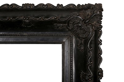 Lot 253 - AN 18TH CENTURY CHINA TRADE , LOUIS XV STYLE EBONISED POSSIBLY ZITAN WOOD CARVED FRAME