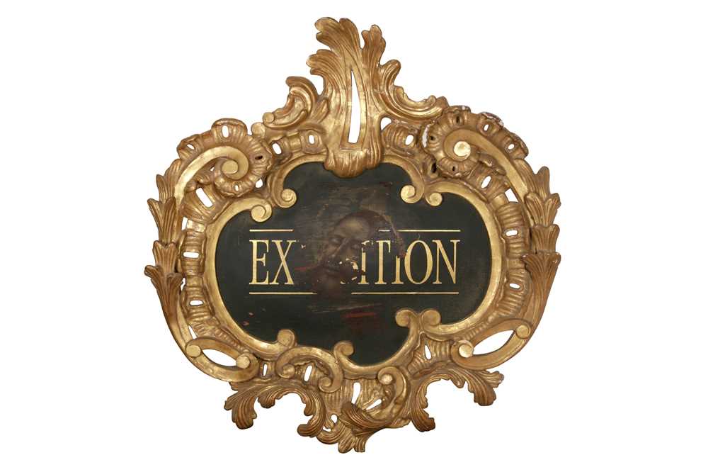 Lot 229 - AN ITALIANATE CARVED AND GILDED LARGE BAROQUE CARTOUCHE FRAME