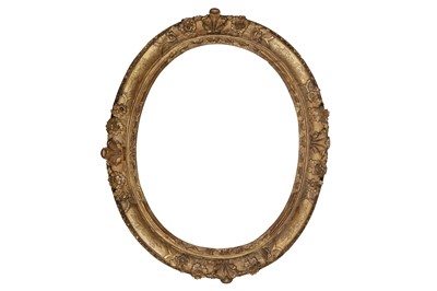 Lot 242 - A FRENCH OAK OVAL LE BRUN SEGMENTED WITH LEAF AND FLOWER HEAD CARVING AT CARDINAL POINTS WITH ENGRAVED FOLIATE REPOSEE PANELS AND DEMI-FLOWER OUTER EDGE FRAME