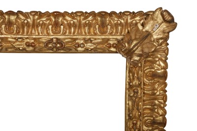 Lot 237 - AN IMPRESSIVE ITALIAN 17TH CENTURY BOLOGNESE CARVED AND GILDED REVERSE PROFILE FRAME
