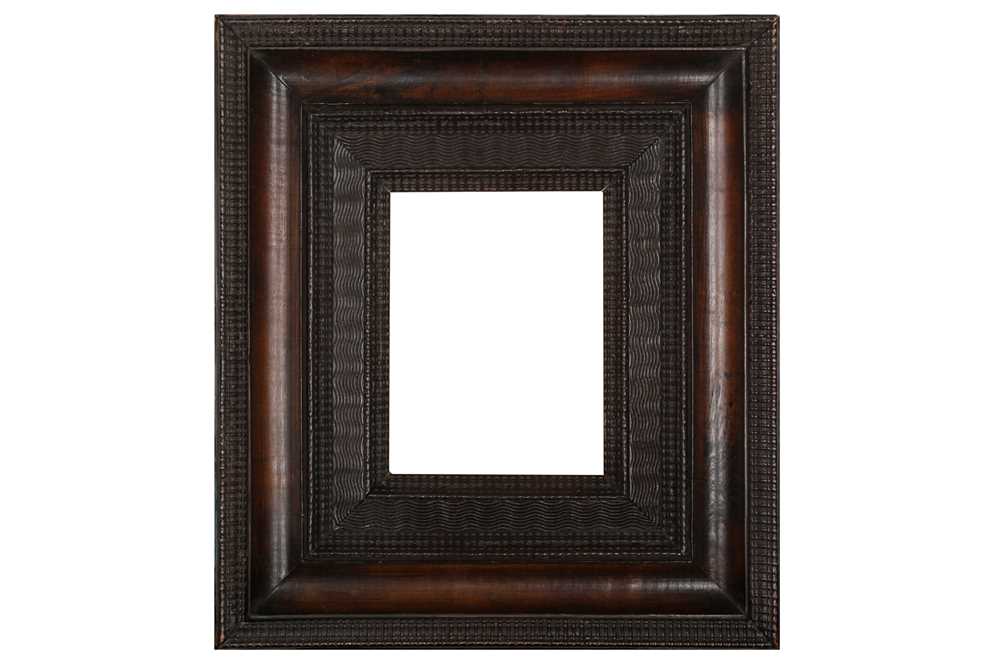 Lot 23 - A NORTH ITALIAN 17TH CENTURY STYLE
POLISHED FRUITWOOD RIPPLE FRAME