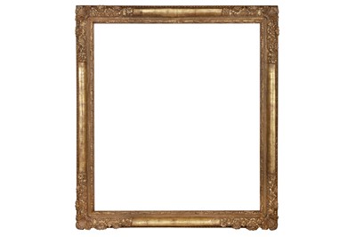 Lot 245 - A BRITISH 20TH CENTURY CARVED AND GILDED LE BRUN STYLE FRAME