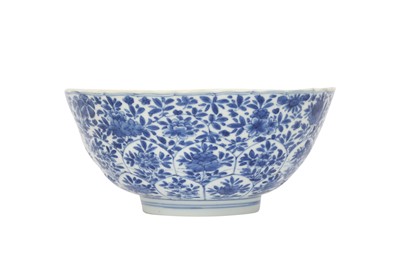 Lot 614 - A CHINESE BLUE AND WHITE MOULDED 'BLOSSOMS' BOWL.