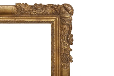 Lot 76 - A FRENCH 17TH CENTURY STYLE CARVED AND GILDED LIMEWOOD LE BRUN FRAME