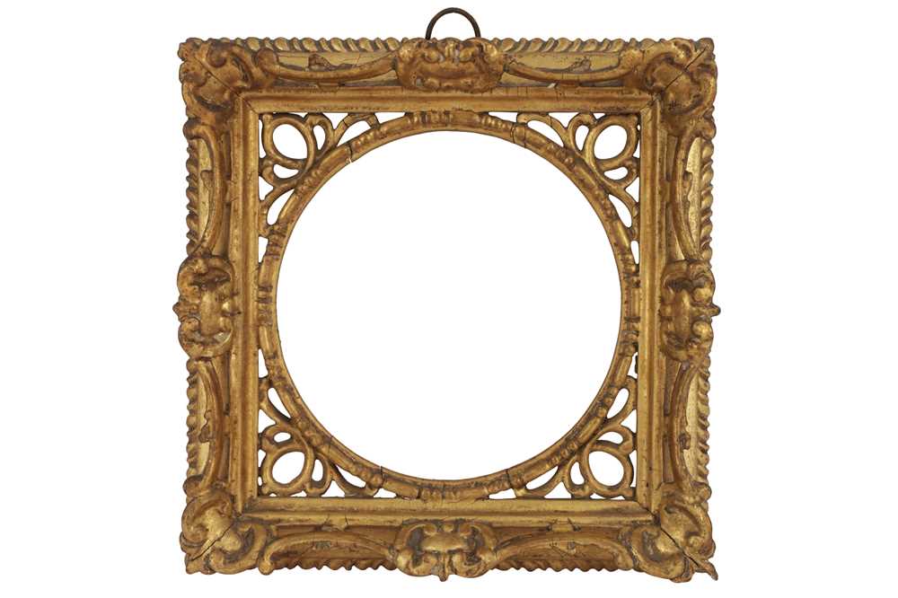Lot 218 - AN ENGLISH 18TH CENTURY CARVED, PIERCED AND GILDED SWEPT FRAME