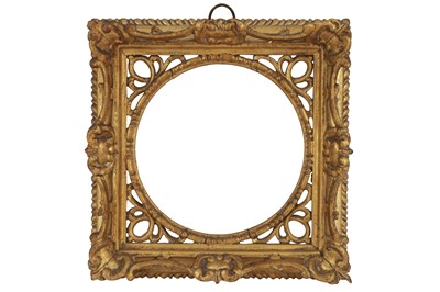Lot 218 - AN ENGLISH 18TH CENTURY CARVED, PIERCED AND GILDED SWEPT FRAME