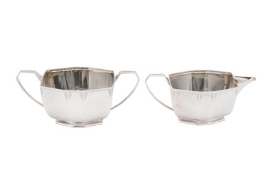 Lot 377 - A George V Art Deco sterling silver four-piece tea and coffee service, Sheffield 1935 by E Viner