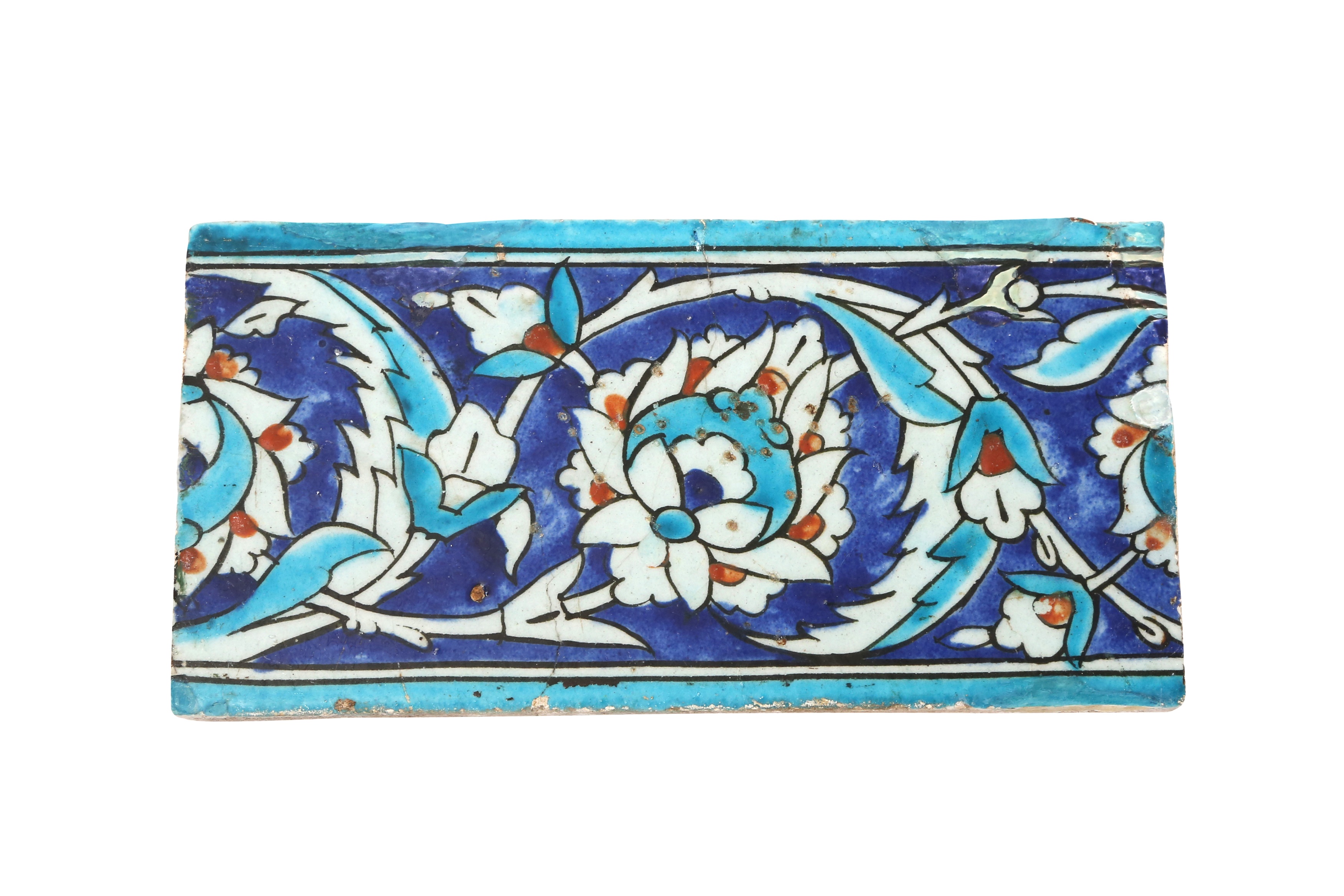 Lot 332 - SEVEN IZNIK POTTERY BORDER TILES WITH LOTUS
