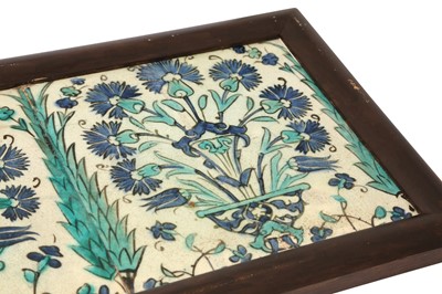 Lot 328 - TWO DAMASCUS POTTERY TILES WITH A VASE OF CARNATIONS AND CYPRESS TREES