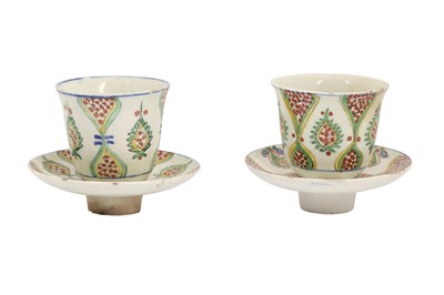 Lot 341 - A NEAR-PAIR OF KUTAHYA POTTERY COFFEE CUPS AND SAUCERS