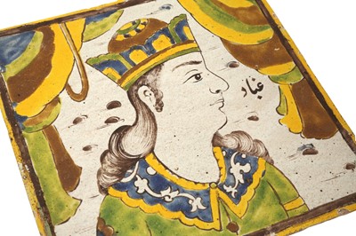 Lot 410 - TWO SAFAVID-STYLE FIGURAL CUERDA SECA POTTERY TILES