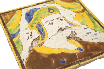 Lot 410 - TWO SAFAVID-STYLE FIGURAL CUERDA SECA POTTERY TILES