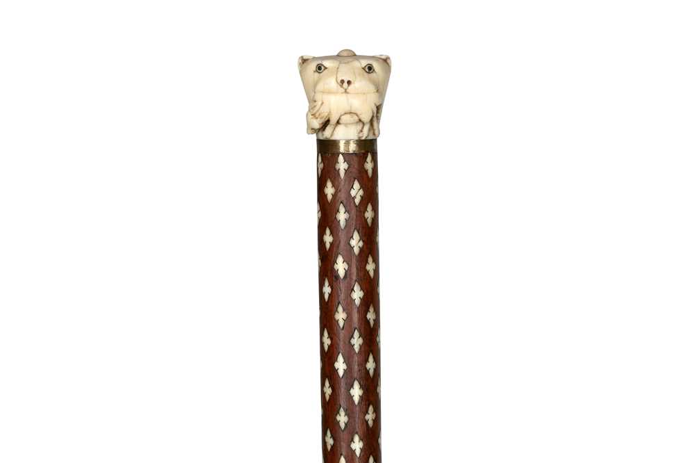 Lot 248 - λ AN INDIAN IVORY-INLAID WALKING STICK WITH CARVED IVORY POMMEL