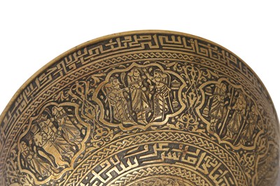 Lot 358 - AN ENGRAVED BRASS BOWL WITH ACHAEMENID-REVIVAL FIGURAL DECORATION
