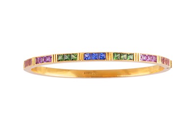 Lot 120 - A multi-coloured sapphire bangle