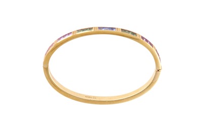 Lot 120 - A multi-coloured sapphire bangle