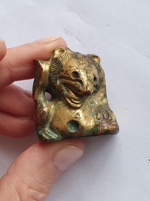 Lot 170 - A PAIR OF CHINESE GILT-BRONZE ‘BEAR’ FITTINGS.
