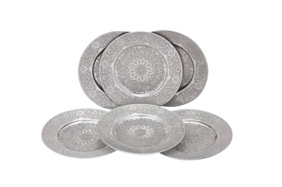 Lot 167 - A set of six mid- 20th century Iranian (Persian) silver underplates or dishes, Isfahan circa 1970 mark of Rabii, retailed by Pirayesh