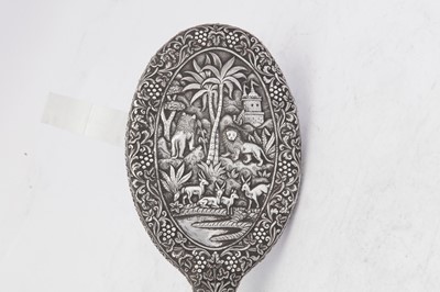 Lot 69 - An early 20th century Anglo – Indian unmarked silver hand mirror, Lucknow circa 1900