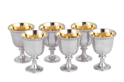 Lot 411 - A set of six Victorian sterling silver egg cups, London 1866 by Hunt and Roskell