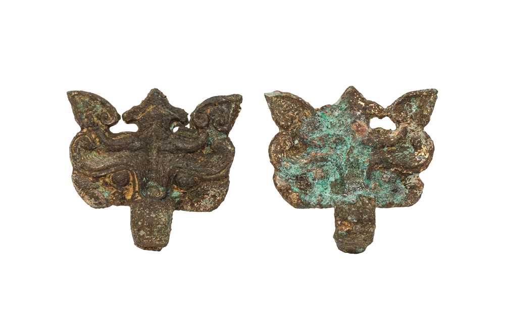 Lot 16 - A PAIR OF CHINESE GILT-BRONZE 'BEAST MASK' FITTINGS.