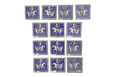 Lot 86 - A GROUP OF THIRTEEN QAJAR MOULDED FALCONER POTTERY TILES
