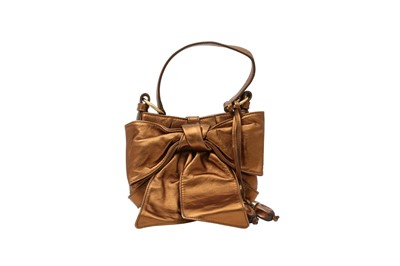 Lot 256 - Yves Saint Laurent Bronze Bow Mini Bag