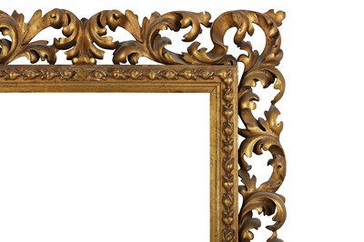 Lot 14 - AN ITALIAN 19TH CENTURY FLORENTINE CARVED, PIERCED AND GILDED FRAME