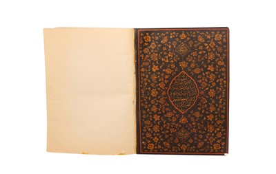 Lot 431 - A LARGE QAJAR QUR’AN PRODUCED IN THE MOURNING PERIOD OF FATH ALI SHAH QAJAR