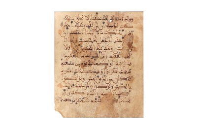 Lot 456 - A LOOSE FOLIO FROM A MAGHRIBI QUR'AN