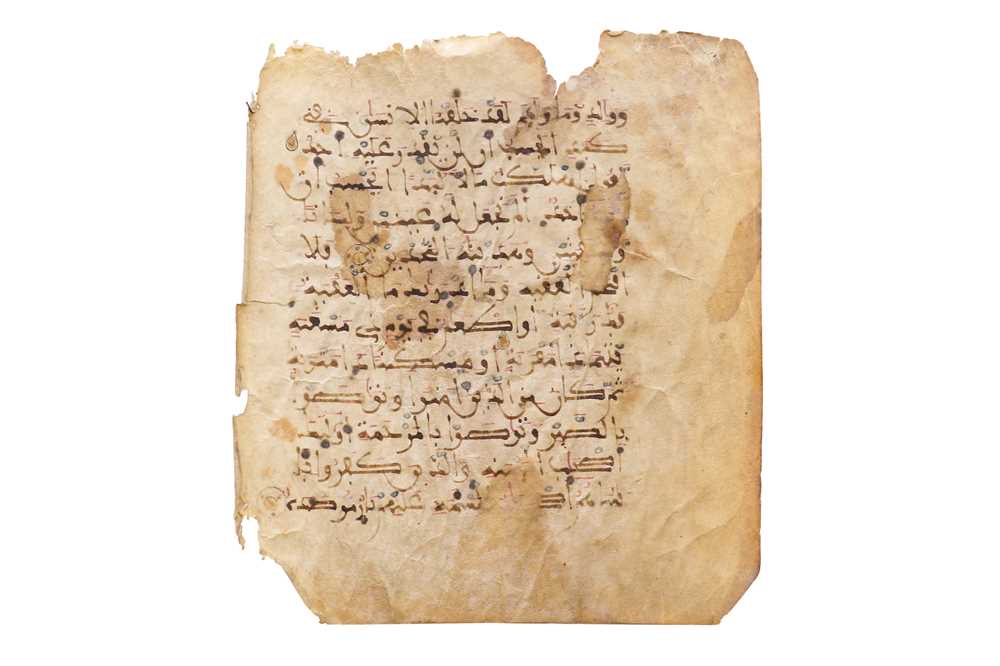 Lot 456 - A LOOSE FOLIO FROM A MAGHRIBI QUR'AN