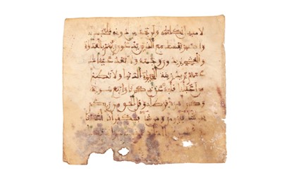 Lot 457 - A LOOSE FOLIO FROM A MAGHRIBI QUR'AN