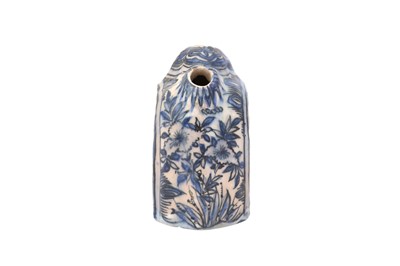 Lot 387 - A PORTABLE BLUE AND WHITE POTTERY QALYAN BOTTLE WITH CHINESE-INSPIRED MOTIFS