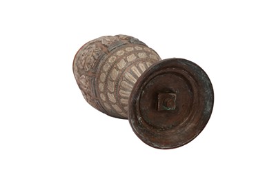 Lot 571 - A TANJORE SILVER-OVERLAID COPPER VASE