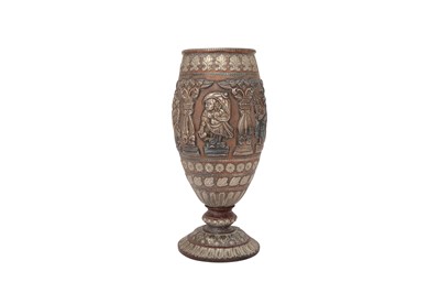 Lot 571 - A TANJORE SILVER-OVERLAID COPPER VASE