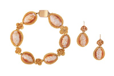 Lot 161 - A shell bracelet and earrings suite