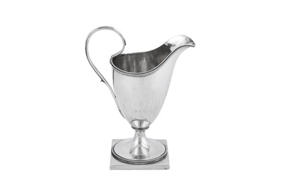 Lot 356 - An early 19th century American silver milk jug, Albany, New York circa 1815 by Timothy Brigden (1774-1819)
