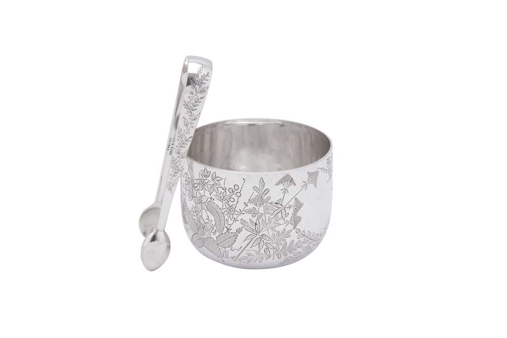 Lot 50 - A late 19th century Indian colonial silver sugar bowl and pair of sugar tongs, Madras circa 1880 by Peter Orr and Sons