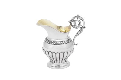 Lot 325 - An early 19th century German silver milk jug, Brunswick circa 1830 by Johann Friedrich Boden (active 1820-48)
