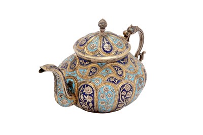 Lot 102 - An early 20th century Anglo – Indian unmarked silver parcel gilt and enamel teapot, Kashmir, Srinagar circa 1900-20