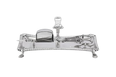 Lot 494 - An early George III sterling silver snuffers on tray, the tray London 1762 by William Cafe