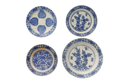Lot 30 - FOUR BLUE AND WHITE CHINESE-INSPIRED POTTERY DISHES